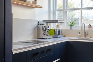 Trendy kitchen photo in London