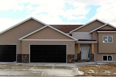 Example of an arts and crafts exterior home design in Other