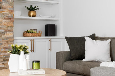 Example of a transitional living room design in Toronto
