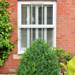 Plantation shutters to complete kitchen decor - Interior Shutters