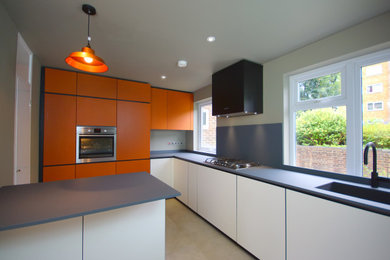 This is an example of a contemporary kitchen in London.