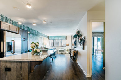 Mid-sized trendy open concept brown floor, wallpaper and vinyl floor living room photo in Denver with white walls and a wall-mounted tv