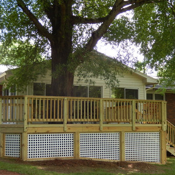 Custom Deck Addition Featuring Square White Vinyl Lattice