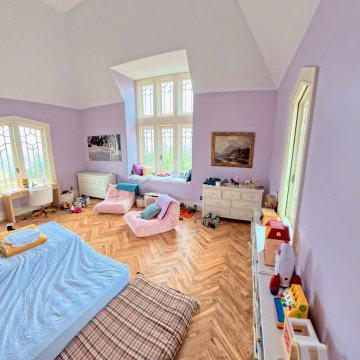 Bright and Playful Kids Bedroom with Custom Herringbone Flooring and Natural Lig