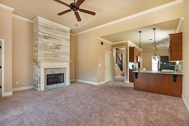 Example of a mid-sized mountain style formal and open concept carpeted and beige floor living room design in Birmingham with beige walls, a standard fireplace, a tile fireplace and no tv