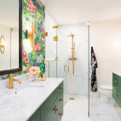 Inspiration for a mid-sized transitional master white tile and porcelain tile porcelain tile, white floor and single-sink bathroom remodel in Charlotte with flat-panel cabinets, green cabinets, a one-piece toilet, white walls, an undermount sink, marble countertops, a hinged shower door, white countertops and a floating vanity