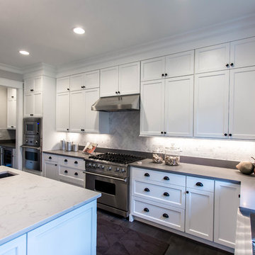Onixaa Pental Quartz island with Concrete Stonewood quartz perimeter and Carrara