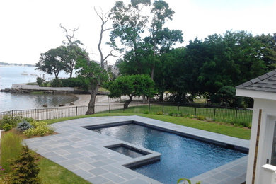 Inspiration for a large contemporary pool remodel in New York