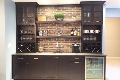 Inspiration for a transitional home bar remodel in Orange County