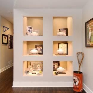 Design ideas for a large traditional look-out basement in Grand Rapids with grey walls, vinyl flooring, a standard fireplace and a tiled fireplace surround.