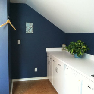 Photo of a medium sized classic utility room in Richmond with a single-bowl sink, white cabinets, laminate countertops, blue walls, cork flooring and a side by side washer and dryer.
