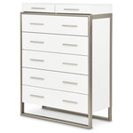 Michael Amini - Marquee 6-Drawer Chest - Cloud White - Embrace the pinnacle of modern style with the Marquee Chest—a versatile piece that allows you to make the most of your space while effortlessly organizing your belongings. Boasting seven drawers, this chest of drawers is designed to simplify your life and unclutter your style. Marquee, known for highlighting the power of clean silhouettes and luxury materials, incorporates brushed stainless steel, glossy lacquer finishes, and matte glass accents into its design. This combination of elements goes beyond functionality; it transforms your living space into a statement of contemporary sophistication.