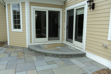 This is an example of a traditional backyard landscaping in New York.