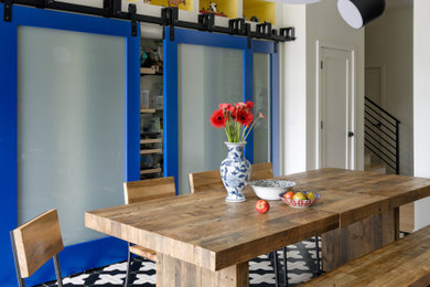 Great room - mid-sized modern black floor great room idea in Seattle with yellow walls