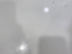 weird blemishes and cloudy areas on quartz countertop