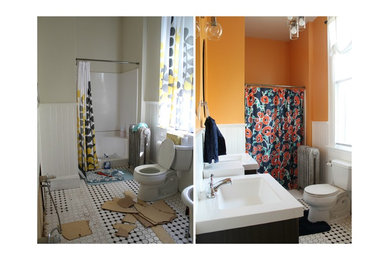 Minimalist ceramic tile claw-foot bathtub photo in Other with orange walls