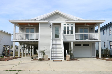 Coastal gray concrete fiberboard exterior home idea in Other