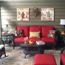Screened porch decorated for Fall.