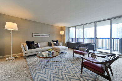 Large minimalist open concept carpeted living room photo in Chicago with gray walls