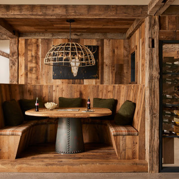 Hand Hewn Timbers and Weathered Antique Paneling in Rustic Farmhouse Wine Nook