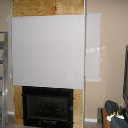 Putting a direct vent fireplace into the living room of a home with no fireplace - Indoor Fireplaces