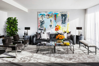 This is an example of a contemporary formal living room in Sydney with grey walls.