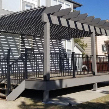 Composite deck with a cedar pergola