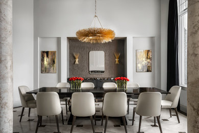 Example of a trendy gray floor dining room design in Miami with white walls