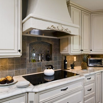 Dark Mahogany Wood Floor, Stone Wall, Bench Seat Bring Kitchen to Life