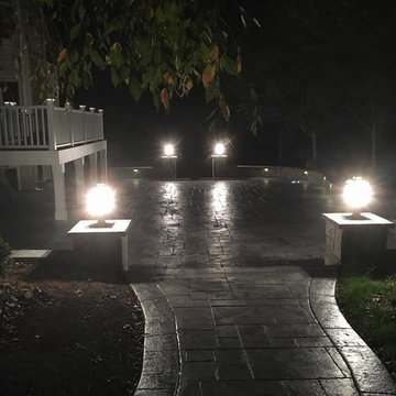 T-Stamped concrete patio, flagstone wall with columns