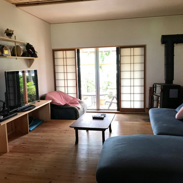 居間、タタキと薪ストーブ