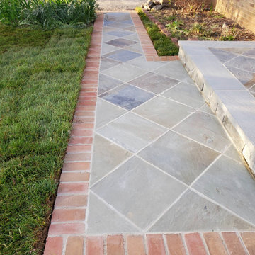 Continuous Diamond Pattern Flagstone Walkway with Thermal and Brick Border