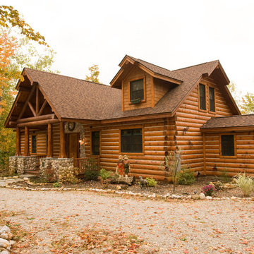 Chinked half log cedar siding