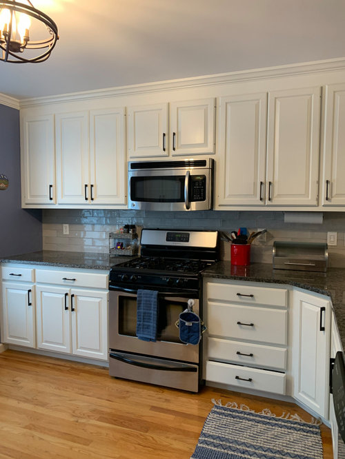 Green wall color to coordinate with Greek Villa kitchen cabinets