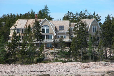 Example of a classic exterior home design in Portland Maine