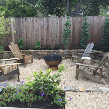 Gravel fire pit area and sunken patio