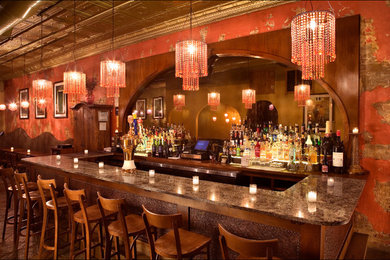 Example of a mid-sized eclectic home bar design in New York