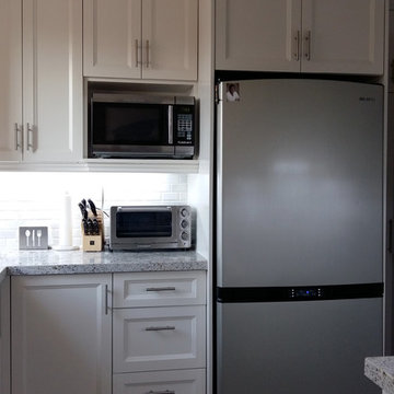 White Kitchen with Custom Storage in Etobicoke