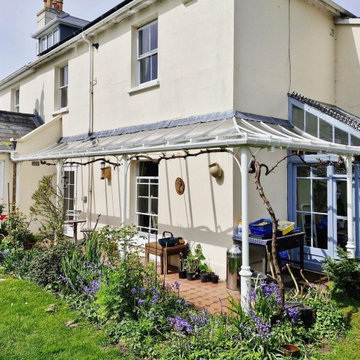 Traditional Column Veranda with Glass Canopy Roof