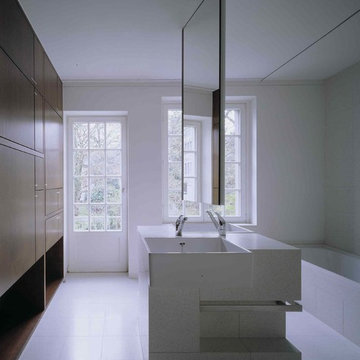 Villa E - Ausbau in Nussbaum und Grünglas