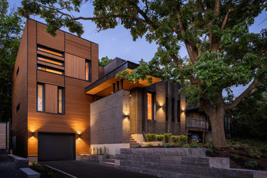 Example of an exterior home design in Ottawa
