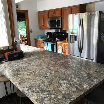cabinet refacing---cherry with new countertops