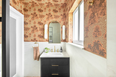 Powder room - tropical powder room idea in Miami