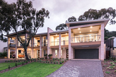 Photo of a contemporary home design in Adelaide.