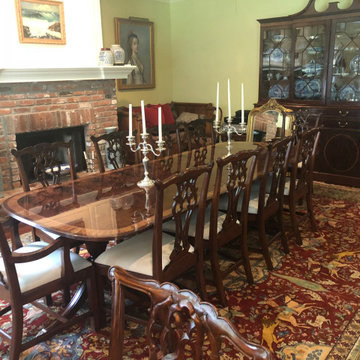 A traditional Mahogany Dining Table with Chippendale Chairs