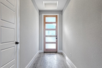 Inspiration for a transitional entryway remodel in Dallas