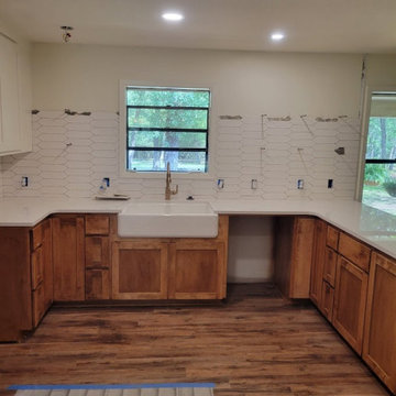 Custom U-Shaped Kitchen Base Cabinetry with Apron Farmhouse Sink