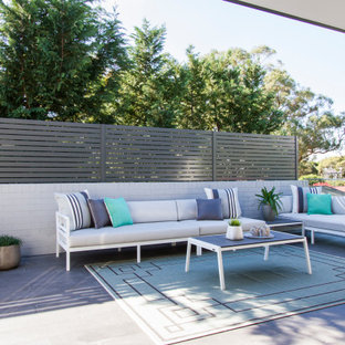 Inspiration for a contemporary patio in Sydney with no cover.