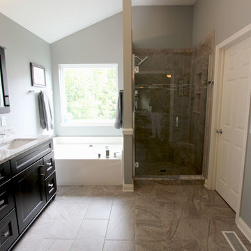 Cherry Onyx Vanity with Cambria Bellingham Countertops and Gray Tiled Shower