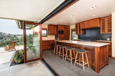 Island style kitchen photo in Orange County